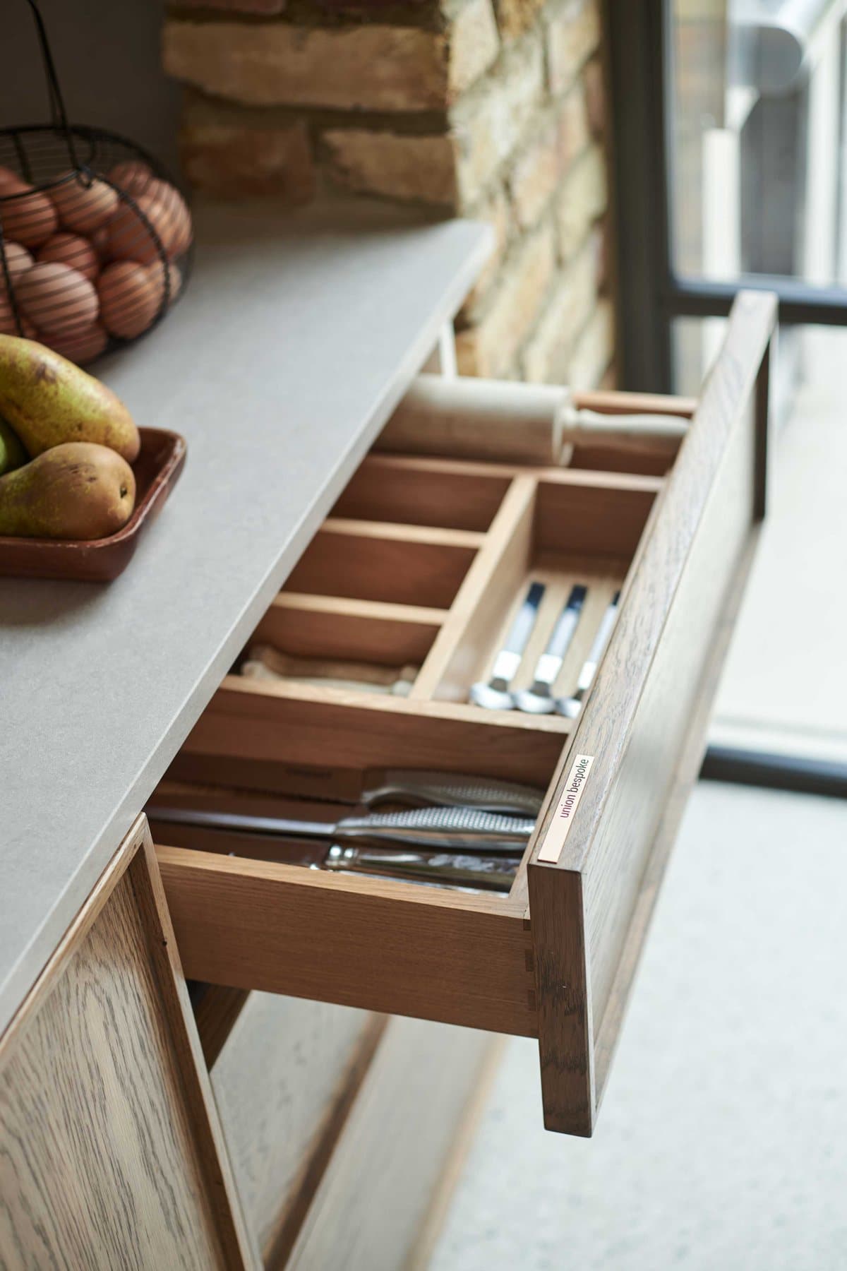 Solid oak cutlery trays, cut to the drawer rather than dropped in